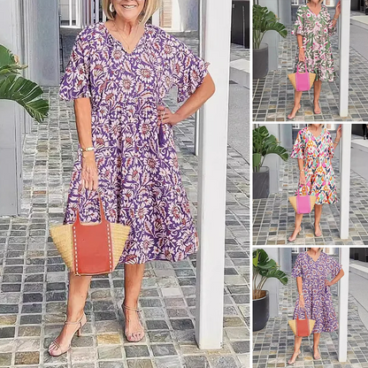 Печатана миди рокля с V-образно деколте