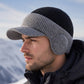 🧢 Vinterstickad mössa för män med skärm och öronlappar