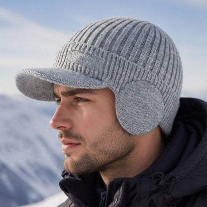 🧢 Vinterstickad mössa för män med skärm och öronlappar